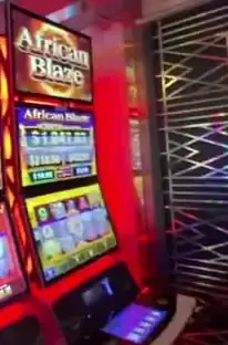 African Blaze title and reels on a Celebrity Infinity slot cabinet