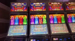 Bao Zhu Zhao Fu Ignite titles above Celebrity Reflection cabinets