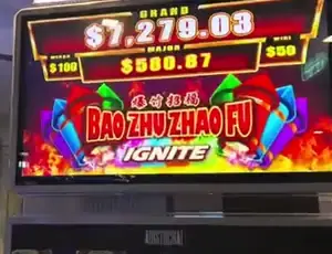 Bao Zhu Zhao Fu Ignite title on a Celebrity Edge slot cabinet