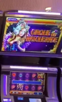 Cirque de Masquerade title on a Celebrity Infinity slot cabinet
