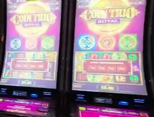 Coin Trio Royale title visible on Celebrity Xcel cabinets