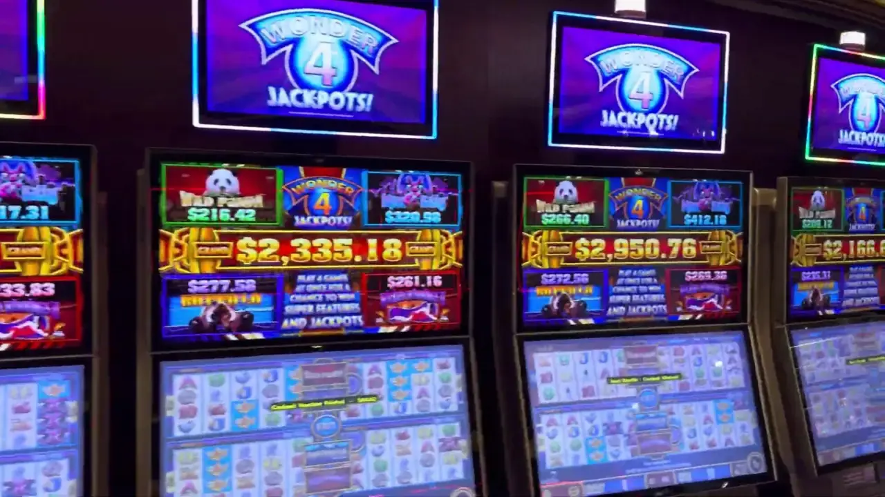 Anthem of the Seas casino video frame showing Wonder 4 Jackpots.