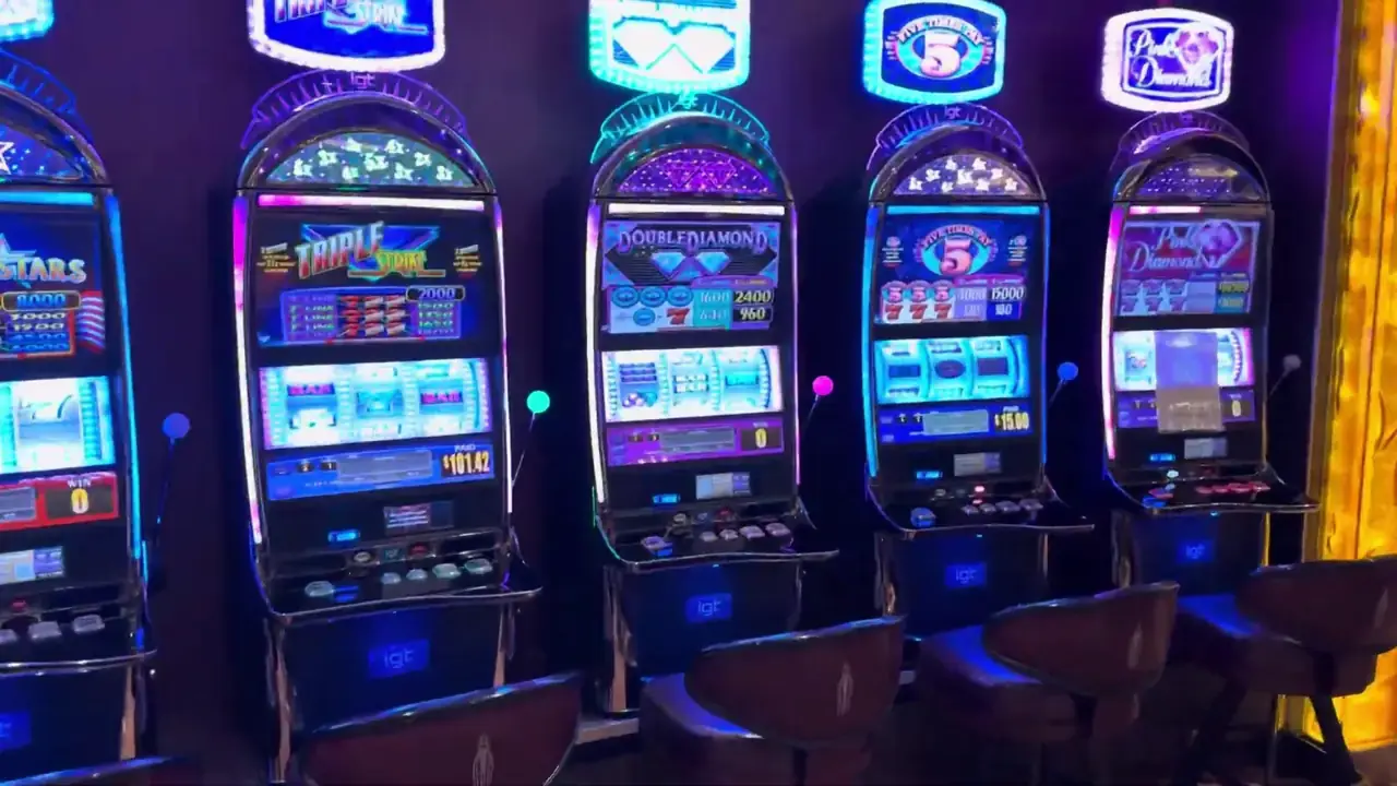 Anthem of the Seas casino video frame showing Double Diamond, Five Times Pay, Pink Diamond, Triple Strike.
