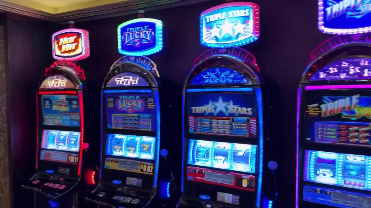 Anthem of the Seas casino video frame showing Hot Hit, Triple Lucky 7.