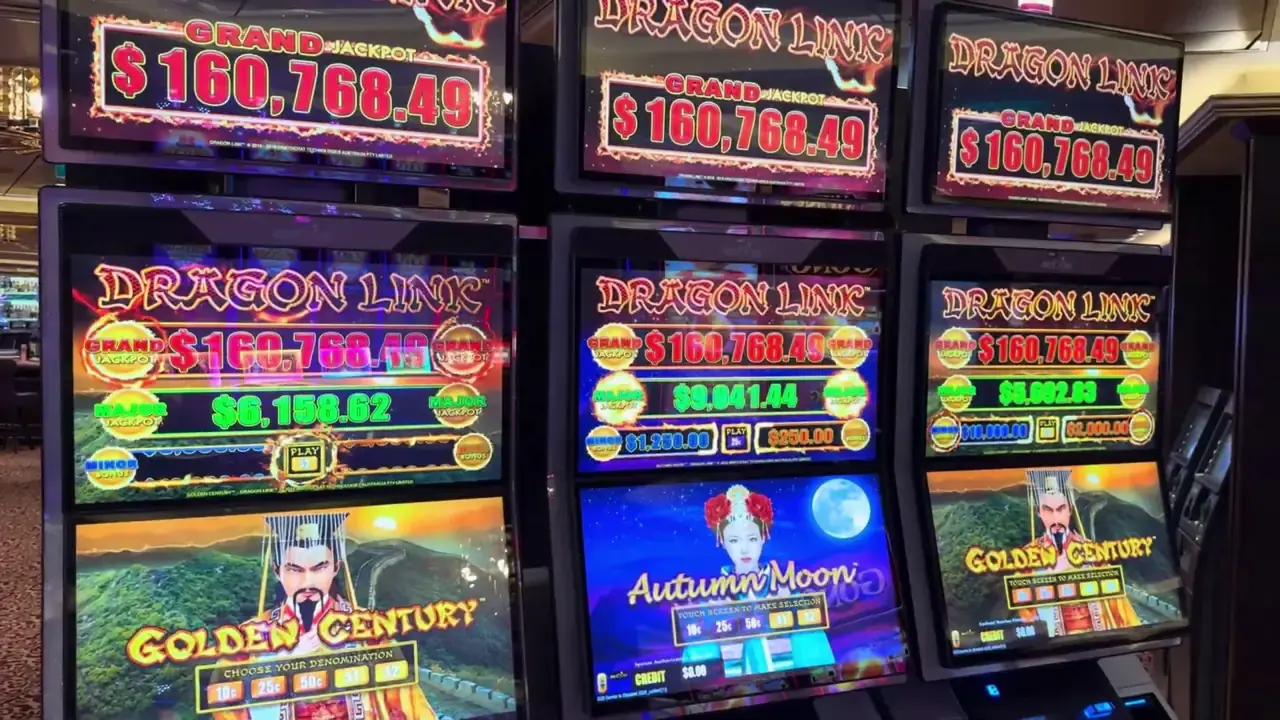 Anthem of the Seas casino video frame showing Dragon Link: Golden Century, Dragon Link: Autumn Moon.