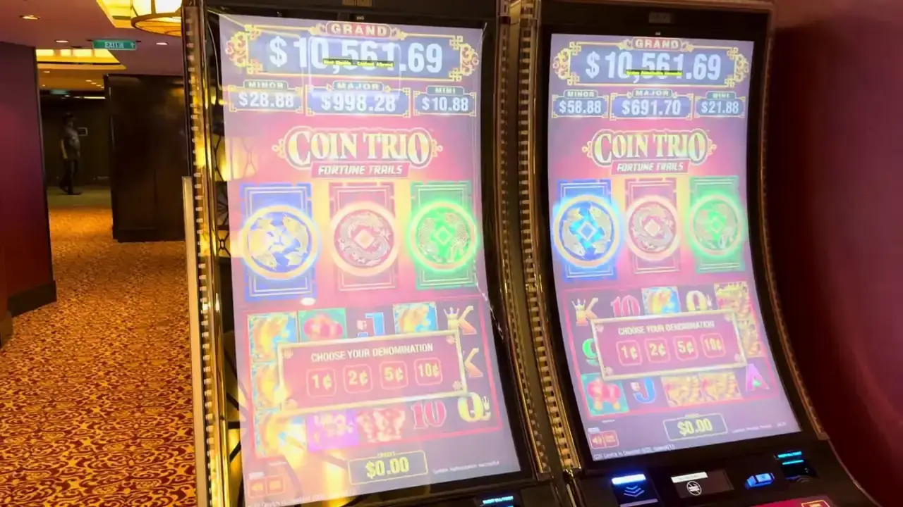 Anthem of the Seas casino video frame showing Coin Trio: Fortune Trails.