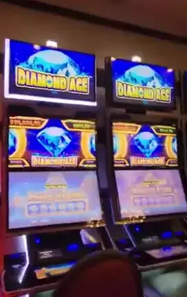 Diamond Ace titles above slot cabinets aboard Celebrity Eclipse