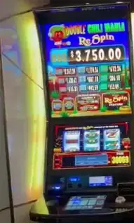 Double Chili Mania title on a Celebrity Apex slot cabinet