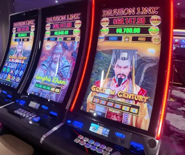 Dragon Link bank, including Golden Century visible on illuminated cabinets aboard Wonder of the Seas.