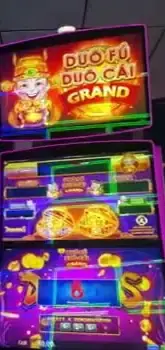 Duo Fu Duo Cai Grand title above Celebrity Reflection slot cabinets