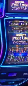 Ultimate Fire Link Power 4 title above a Celebrity Reflection cabinet