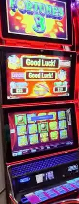 Fortunes 8 slot cabinet with the game name visible above its screens