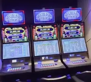 Gold Stacks titles above three Celebrity Edge slot cabinets