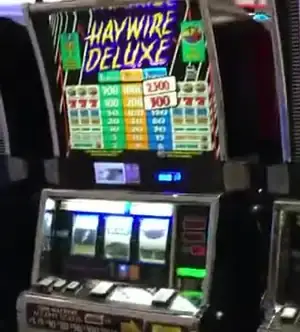 Haywire Deluxe title and paytable on a Celebrity Millennium cabinet