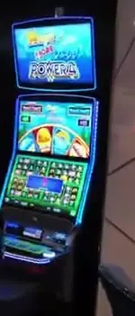 Huff N' More Puff Power 4 title above a Celebrity Beyond slot cabinet