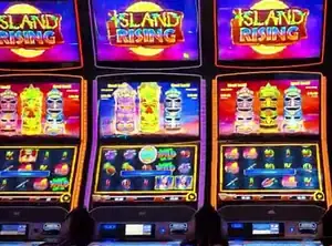 Island Rising titles above Celebrity Xcel slot cabinets