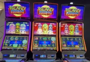 Island Rising titles above three Celebrity Apex slot cabinets
