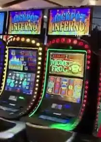 Jackpot Inferno titles above Celebrity Edge slot cabinets