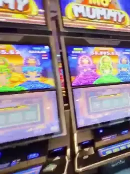 Mo' Mummy titles visible above Celebrity Edge slot cabinets