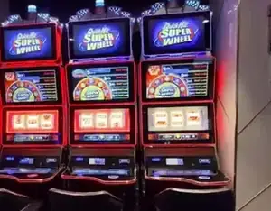 Quick Super Wheel titles above Celebrity Edge slot cabinets