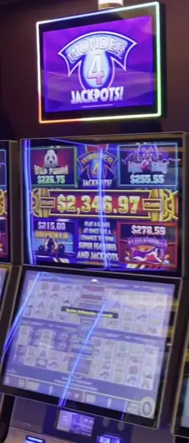 Wonder 4 Jackpots cabinets in the Odyssey of the Seas walkthrough.