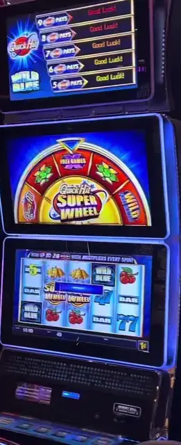 Quick Hit Super Wheel Wild Blue cabinets in the Navigator of the Seas walkthrough.