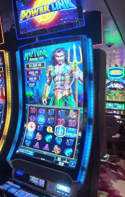 Neptune Power Link cabinet in the Wonder of the Seas casino walkthrough.