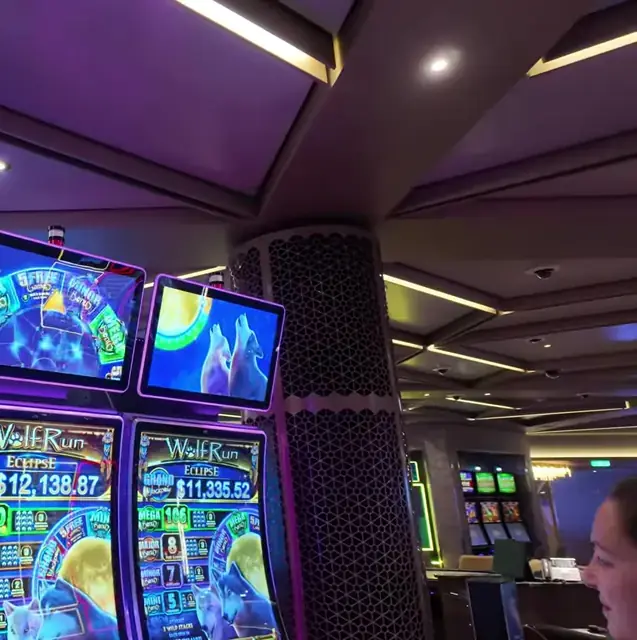 Wolf Run Eclipse cabinet in the Wonder of the Seas casino walkthrough.