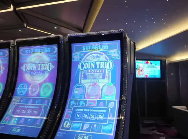 Coin Trio Royal: Goldie cabinet in the Wonder of the Seas casino walkthrough.