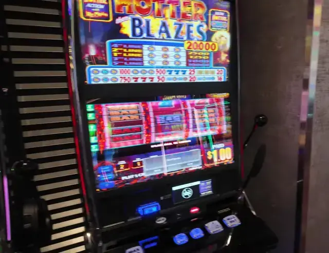 Hotter Blazes cabinet in the Wonder of the Seas casino walkthrough.