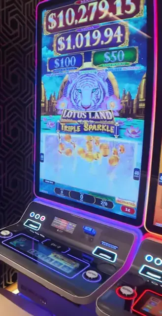 Lotus Land Triple Sparkle cabinet in the Wonder of the Seas casino walkthrough.