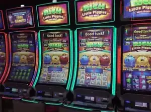 Rich Little Piggies titles above Celebrity Ascent slot cabinets