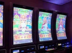 Spooky Link game title and character art on a Celebrity Xcel cabinet