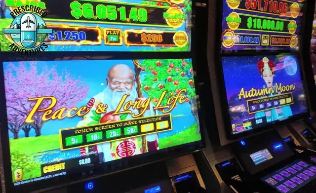 Slot cabinets showing Dragon Link: Peace & Long Life, Dragon Link: Autumn Moon aboard Jewel of the Seas.