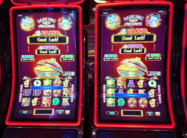 Slot cabinets showing Dancing Drums aboard Independence of the Seas.