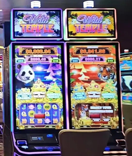 Slot cabinets showing Wild Temple aboard Icon of the Seas.