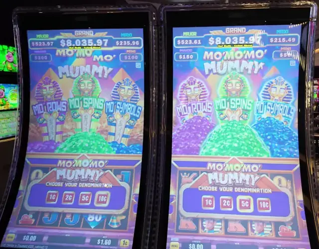 Slot cabinets showing Mo’ Mo’ Mo’ Mummy aboard Legend of the Seas.