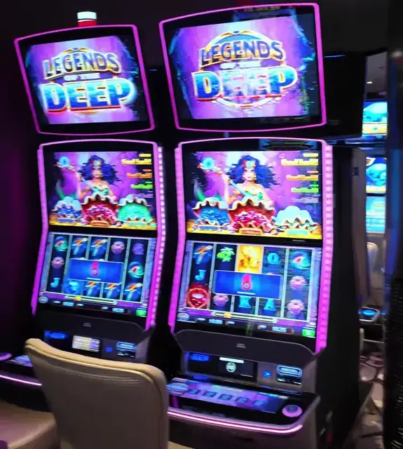 Slot cabinets showing Legends of the Deep aboard Legend of the Seas.