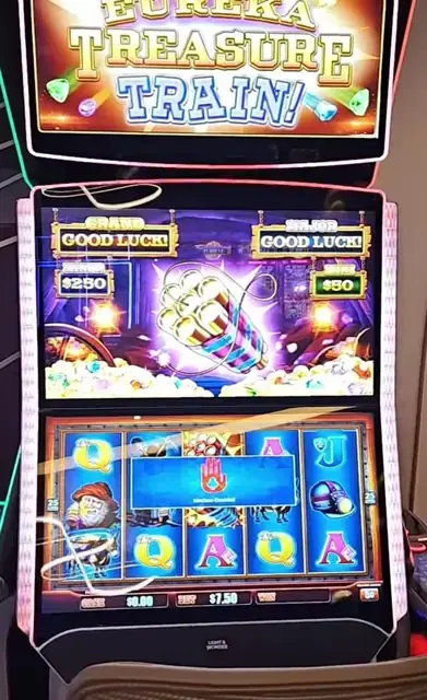 Slot cabinets showing Treasure Train aboard Icon of the Seas.