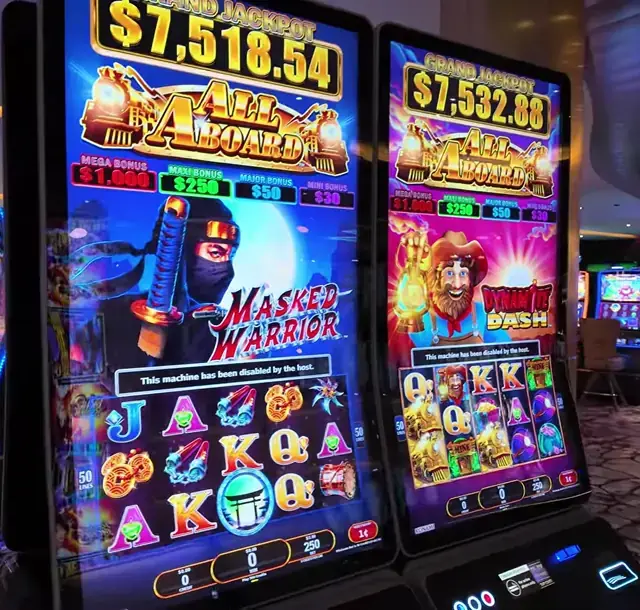 Slot cabinets showing All Aboard: Masked Warrior, All Aboard: Dynamite Dash aboard Legend of the Seas.