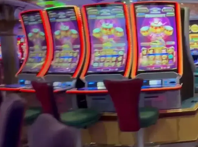 Casino floor overview; individual titles are not legible in this frame cabinets in the Serenade of the Seas walkthrough.