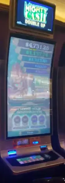 Mighty Cash Double Up machine cabinet visible in the credited ship casino walkthrough.