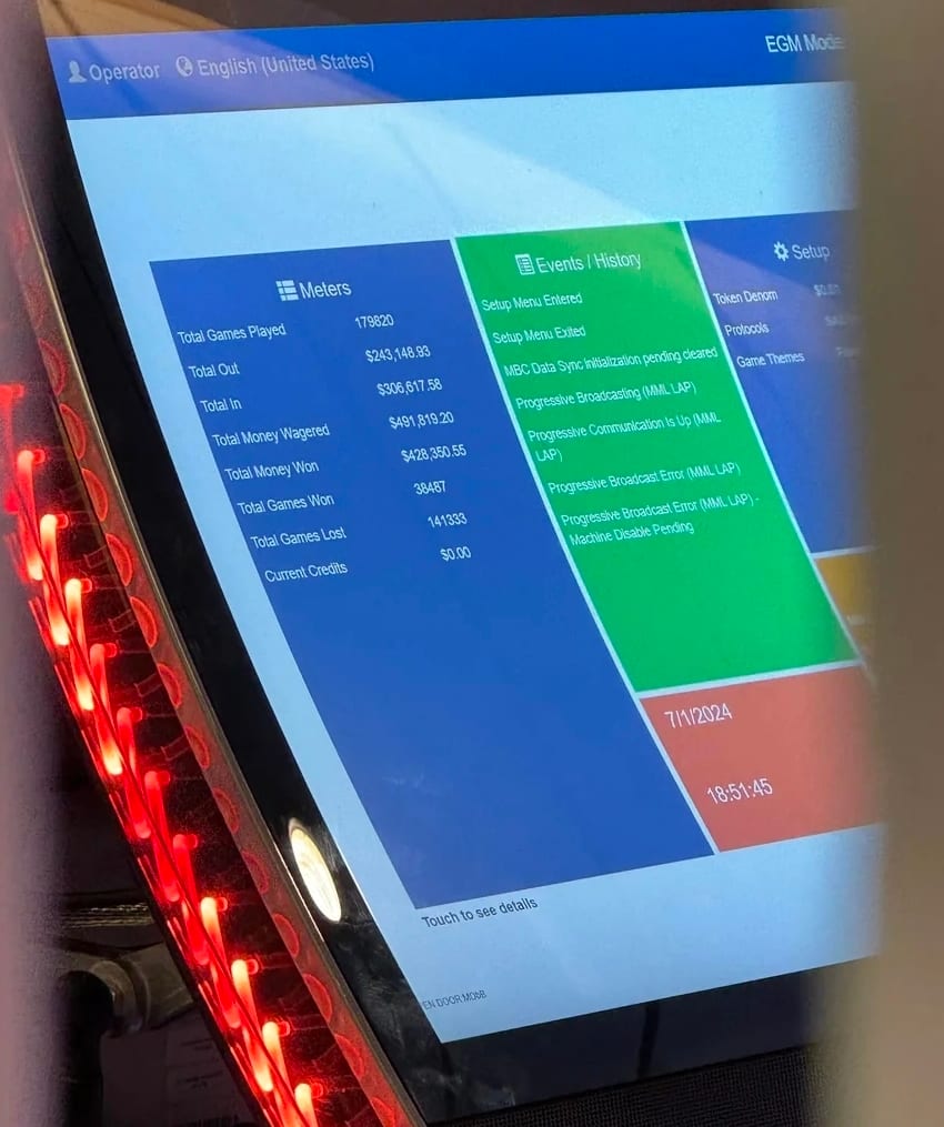 Slot machine attendant screen on Carnival Jubilee showing lifetime meters for a Dragon Link cabinet: $491,819.20 total wagered and $428,350.55 total won, an 87.1 percent return to player.